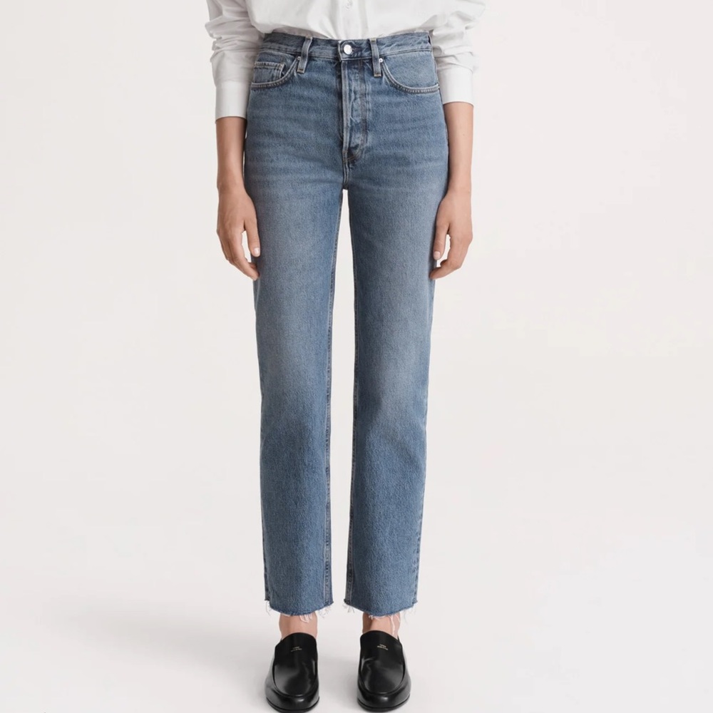 TOTEME Classic straight leg vintage wash jeans with cropped raw hem